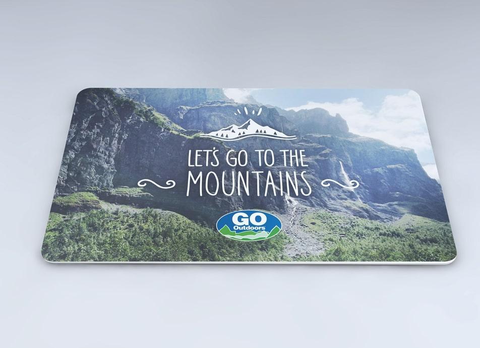 Go Outdoors gift card with image of a mountain, white text and logo